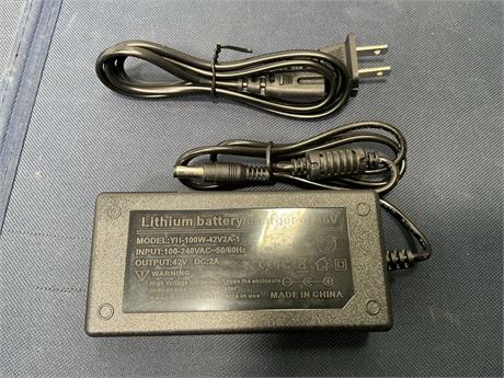 Model :  YH-100 42V 2A  Imput: 100-240VAC-50/60Hz Output: 42V.  DC:2A Power