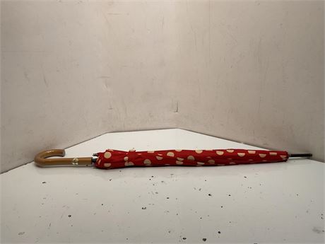 red and tan vintage polka dot umbrella