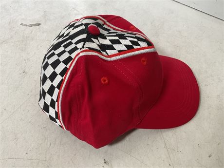 red and checkered cap