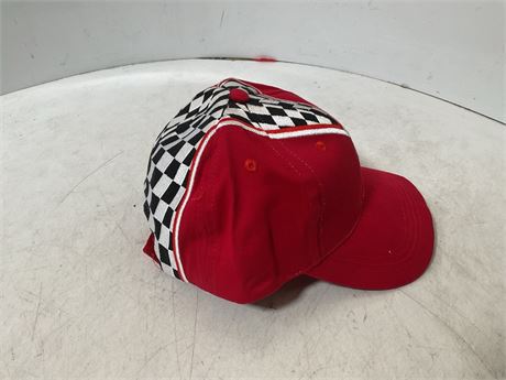 red and checkered cap