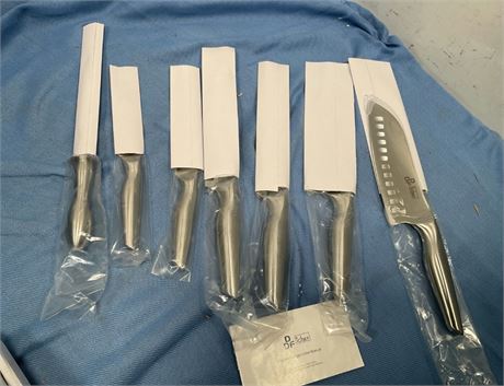 This set is the DF Chef Kitchen Knife Set, featuring knives with full stainless