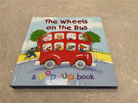 The wheels on the bus book a pop up book