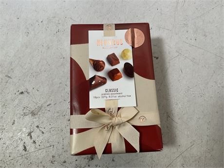 The Classic Ballotin (1 lb) contains 38 iconic Neuhaus chocolates; a selection